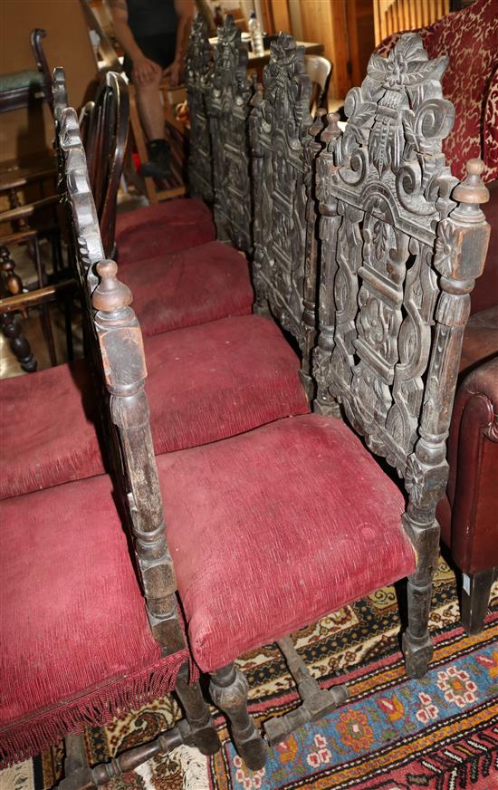 Set of six late 19th century Carolean style carved oak dining chairs(-)